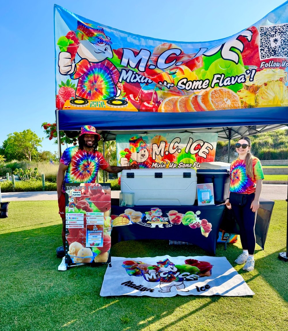 M.C. Ice mobile Italian ice catering pop-up tent at a Fort Myers corporate event